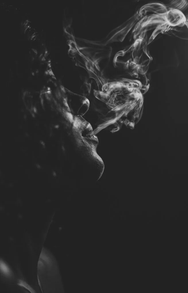 Moody black and white portrait of a woman exhaling Tolerance to Carbon Dioxide